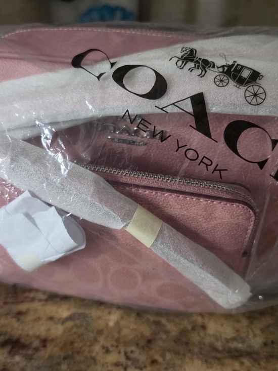 Coach Handbags - Coach Pink Signature Crossbody Bag And Wristlet NWT